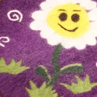 Handgefertigtes Filzkissen Lila Sonne - Sitztaler Unikate...